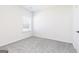 Neutral bedroom featuring carpeted floors, a window, and white walls at 3724 Saddle Bag Ct, Dacula, GA 30019