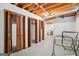 Unfinished basement with open ceilings and possible storage area at 1214 Lambeth Se Way, Conyers, GA 30013