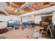 Finished basement providing a versatile space, including a pool table area, entertainment setup and unfinished ceiling at 1214 Lambeth Se Way, Conyers, GA 30013
