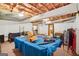 Basement featuring an unfinished ceiling and a pool table area for recreation and gatherings at 1214 Lambeth Se Way, Conyers, GA 30013