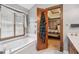 Bathroom featuring a bathtub and a window offering natural light at 1214 Lambeth Se Way, Conyers, GA 30013