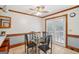 Cozy breakfast nook featuring casual table and chairs, and outdoor access at 1214 Lambeth Se Way, Conyers, GA 30013