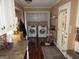 A functional laundry room with modern front-loading machines and overhead cabinets for efficient storage at 5848 Navarre Ct, Stone Mountain, GA 30087
