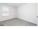 A bedroom featuring carpeted floors and natural light at 3323 Arabian Farm Ln, Dacula, GA 30019
