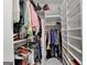Walk-in closet with built in shelving and clothes racks at 3112 Patriot Sq, Marietta, GA 30064