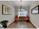 Formal dining room with hardwood floors, chandelier, and traditional furnishings at 3112 Patriot Sq, Marietta, GA 30064
