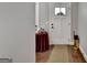 Entryway featuring a stylish table with decor and a view of a door with glass panels at 3112 Patriot Sq, Marietta, GA 30064