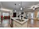 Open concept kitchen with granite countertops, stainless steel appliances and an island at 3112 Patriot Sq, Marietta, GA 30064