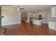Open living space with fireplace seamlessly connects to kitchen with island at 3112 Patriot Sq, Marietta, GA 30064