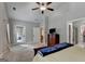Spacious main bedroom featuring high ceilings, plush carpet, ensuite bath and patio access at 3112 Patriot Sq, Marietta, GA 30064