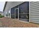 Exterior view of a home showing a screened porch perfect for enjoying the outdoors at 3112 Patriot Sq, Marietta, GA 30064