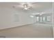 Expansive finished basement with neutral carpet, ideal for recreation or Gathering gatherings at 133 Sea Island Dr, Peachtree City, GA 30269