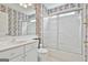 Bathroom featuring a vanity, toilet, and shower/tub combination with sliding doors at 133 Sea Island Dr, Peachtree City, GA 30269