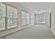 Bright bedroom featuring large windows offering lots of natural light and a ceiling fan at 133 Sea Island Dr, Peachtree City, GA 30269