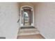 Inviting front door with glass detailing and brick steps leading to the entrance of the home at 133 Sea Island Dr, Peachtree City, GA 30269