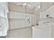 Bright kitchen featuring white cabinetry and a functional layout, perfect for everyday living and entertaining at 133 Sea Island Dr, Peachtree City, GA 30269
