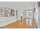 Open-concept living room boasts hardwood floors, a fireplace, built-in shelving, and great flow for easy living and entertaining at 133 Sea Island Dr, Peachtree City, GA 30269