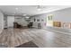 Finished basement area with hard surface floors, recessed lighting, TV area, and comfortable seating at 150 Surrey Chase Dr, Social Circle, GA 30025