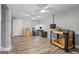 Spacious office featuring hard surface floors, ceiling fan, dual monitors, and a well-lit workspace at 150 Surrey Chase Dr, Social Circle, GA 30025
