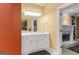 Bathroom with a sink and vanity, featuring a neutral color palette and an entrance to another room at 1014 Overlook Dr, Villa Rica, GA 30180