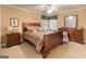 Bedroom with matching wood furniture, neutral carpeting, and a window offering natural light at 1014 Overlook Dr, Villa Rica, GA 30180