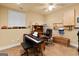 Versatile bonus room or home office featuring natural light and ample space for various activities at 1014 Overlook Dr, Villa Rica, GA 30180