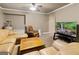 A spacious recreation room with multiple seating areas and a television, perfect for entertaining at 1014 Overlook Dr, Villa Rica, GA 30180