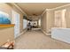 A spacious recreation room with multiple areas for activities, providing ample space for leisure and entertainment at 1014 Overlook Dr, Villa Rica, GA 30180