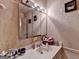 Bathroom with vanity, sink, large mirror, and decor at 3346 Northcrest Rd # A, Atlanta, GA 30340