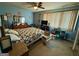 Comfortable bedroom with ceiling fan, dresser, and natural light from window at 3346 Northcrest Rd # A, Atlanta, GA 30340