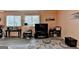 Cozy living room with television, tables and area rug at 3346 Northcrest Rd # A, Atlanta, GA 30340
