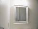 Bathroom featuring a white framed mirror, light colored walls, and white trim at 4651 Garden Hills Dr, Stone Mountain, GA 30083