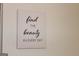 A motivational sign hangs on a wall, adding a touch of inspiration and style to the room at 4651 Garden Hills Dr, Stone Mountain, GA 30083