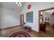 Cozy living room featuring a vaulted ceiling, tile flooring, and wood trim at 715 Branchview Ct, Mcdonough, GA 30252