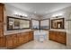 Luxurious bathroom featuring dual vanities, a large tub, and ample lighting at 715 Branchview Ct, Mcdonough, GA 30252