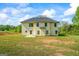View of the back exterior and yard at 634 Gardner Rd, Stockbridge, GA 30281