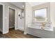 Bright bathroom with soaking tub and separate shower at 634 Gardner Rd, Stockbridge, GA 30281