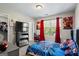 Spiderman themed bedroom with carpet, window and tv, perfect for a or young fan at 634 Gardner Rd, Stockbridge, GA 30281