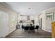 Bright dining area connected to the kitchen with modern table set at 634 Gardner Rd, Stockbridge, GA 30281