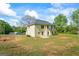 This two-story home features a spacious backyard with an exterior featuring horizontal siding at 634 Gardner Rd, Stockbridge, GA 30281