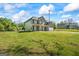 Exterior of a lovely two-story home with a spacious lawn at 634 Gardner Rd, Stockbridge, GA 30281