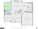 Layout of main floor featuring living room, dining area, kitchen, garage and bedroom at 634 Gardner Rd, Stockbridge, GA 30281
