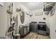 Laundry room with modern appliances and ample storage, designed for efficient and organized cleaning at 634 Gardner Rd, Stockbridge, GA 30281