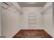 Walk-in closet with wire shelving and neutral carpeting at 113 Elmwood Dr, Hampton, GA 30228
