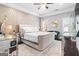 Stylish bedroom with decorative accents, elegant furnishings, and a soft rug at 1450 Elizabeth Ln, East Point, GA 30344