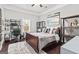 Serene bedroom with dark hardwood floors, a plush rug, and natural light at 1450 Elizabeth Ln, East Point, GA 30344