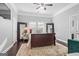Spacious bedroom boasts a cozy rug, stylish furniture, and ample natural light at 1450 Elizabeth Ln, East Point, GA 30344