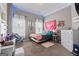 Bedroom features LED lighting, natural lighting, and decorative accents at 240 Sturry Dr, Mcdonough, GA 30252