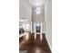 Spacious foyer features soaring ceilings and dark hardwood flooring, creating a grand entrance at 240 Sturry Dr, Mcdonough, GA 30252