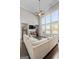 Spacious living room featuring vaulted ceiling, fireplace, and large windows at 240 Sturry Dr, Mcdonough, GA 30252
